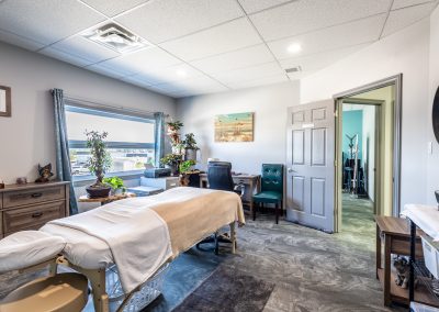 Massage therapy session at Abundant Holistic Health, emphasizing personalized care and wellness at Harmony Landing.