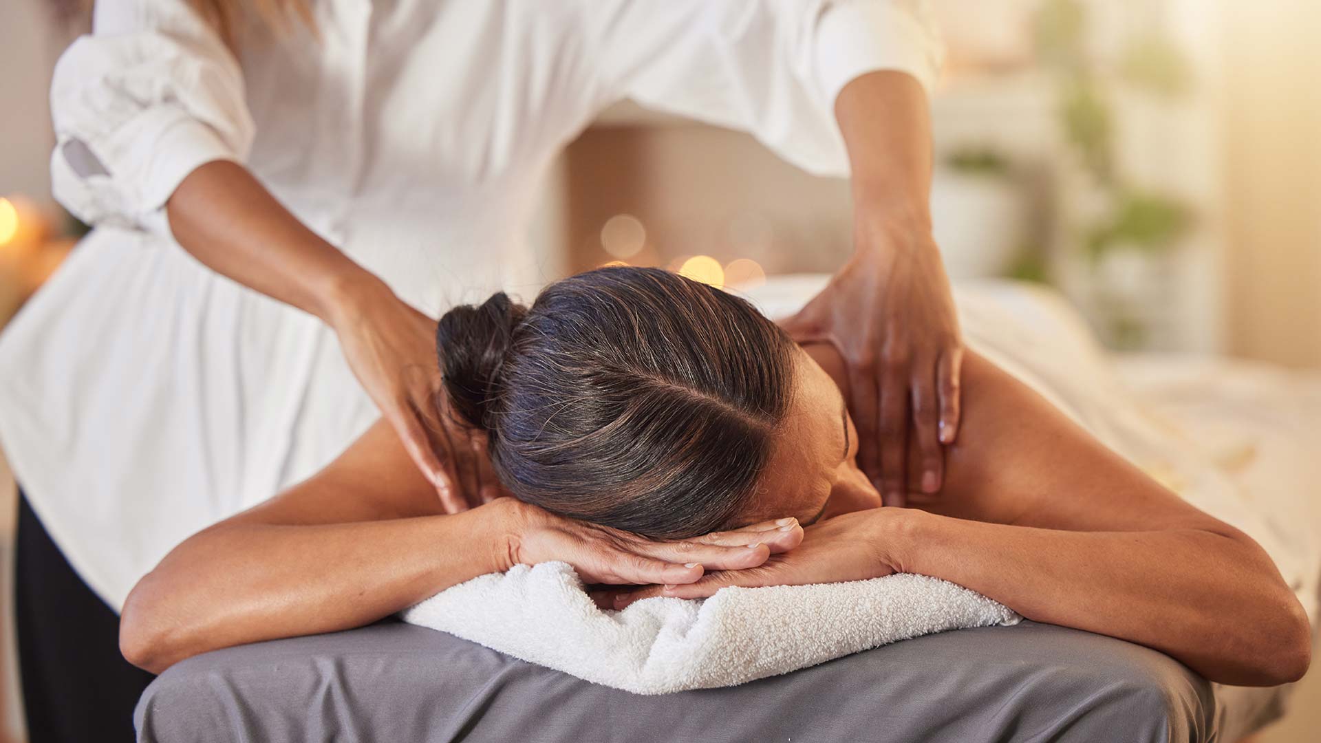 woman-at-spa-for-massage-with-therapist-and-holist-2026-03-25-08-20-48-utc